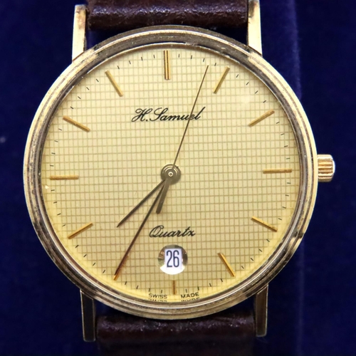 113 - H Samuel; gents calendar wristwatch on brown leather strap, working at lotting. P&P Group 1 (£14+VAT... 