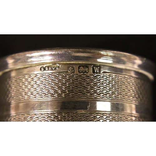 127 - Five hallmarked silver napkin rings, a silver plate example and a silver plate bottle collar, combin... 