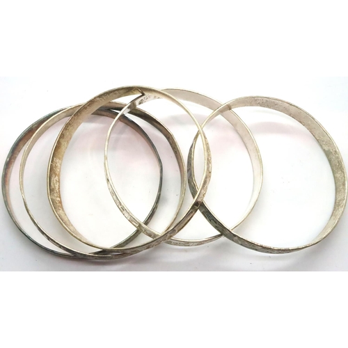 59 - Five 925 silver bangles. P&P Group 1 (£14+VAT for the first lot and £1+VAT for subsequent lots)