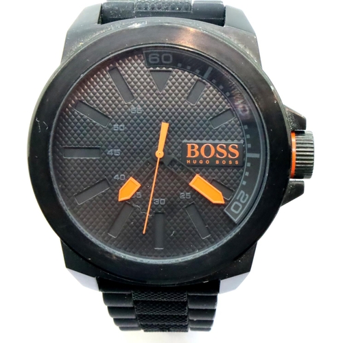 89 - Boss; oversized gents wristwatch on a rubber strap, requires battery. P&P Group 1 (£14+VAT for the f... 