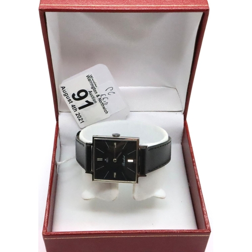 91 - Ebel; vintage ultra slim gents wristwatch, President model with square black dial, silver hands and ... 