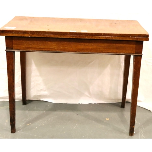 512 - 19th century walnut fold-over tea table, on tapering supports, 92 x 45 x 73 cm H.  Not available for... 