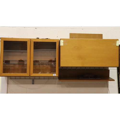 461 - Believed Beaver and Tapley wall mounted teak units with hangers, glass fronted cupboard to measure 8... 