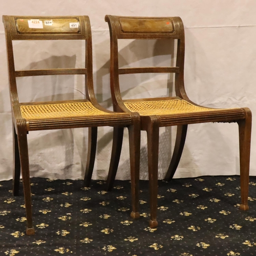 491 - *** WITHDRAWN *** A pair of Regency period walnut framed chairs, each with bar-back and Bergere seat... 