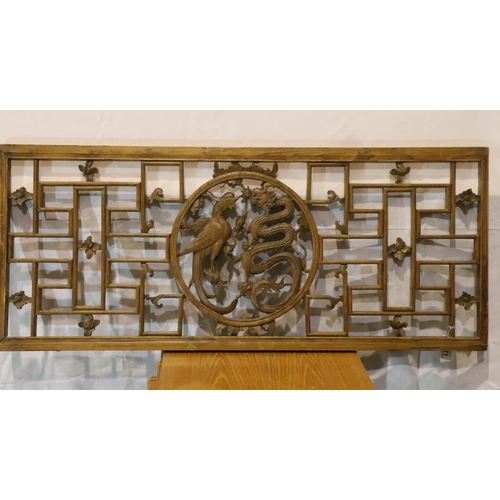 499 - 19th Century Chinese fretwork wooden panel with dragon and phoenix central motif, 49 x 112 cm. Not a... 