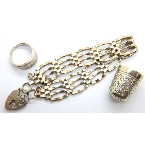 74 - Hallmarked silver gate bracelet, 925 silver ring and thimble, combined 27g. P&P Group 1 (£14+VAT for... 