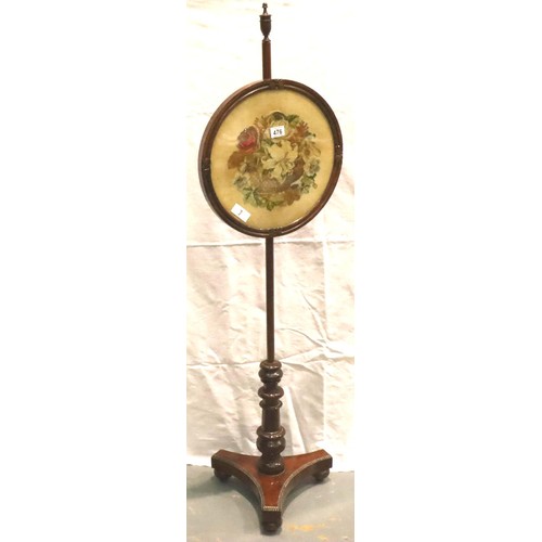 476 - Walnut pole screen with embroidered floral panel, H: 141 cm. Not available for in-house P&P, contact... 