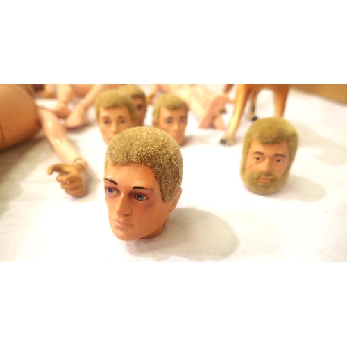 2097 - Six Action Man dolls, flock hair plus five heads includes moving eyes and bearded, also dog, mostly ... 