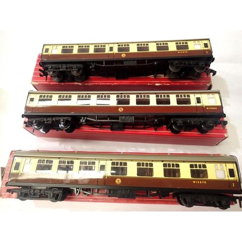 2064 - Three Hornby Dublo Choc/Cream coaches, two or three rail, in fair to good condition, wrong/poor boxe... 