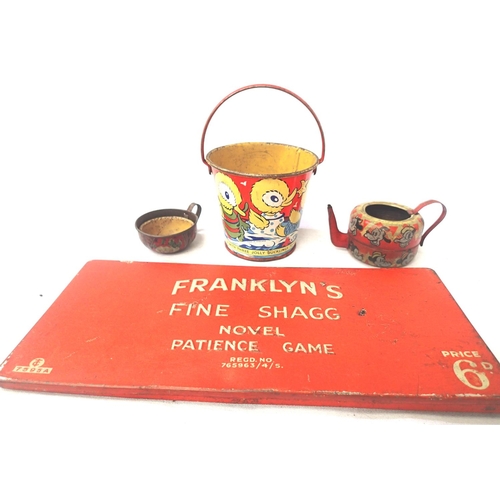 2077 - Vintage tinplate toys; Humpty Dumpty bucket, Mickey Mouse kettle and Franklyns Fine Shagg Patience g... 