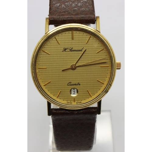 104 - H Samuel; gents calendar wristwatch on brown leather strap, working at lotting. P&P Group 1 (£14+VAT... 