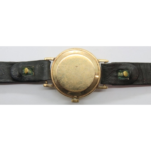 112 - Rotary; 9ct gold ladies wristwatch on a leather strap, working at lotting. P&P Group 1 (£14+VAT for ... 