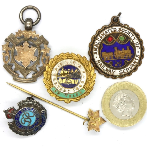 59 - Two enamel badges including Royal Engineers, two fobs including a silver example with gold wash and ... 