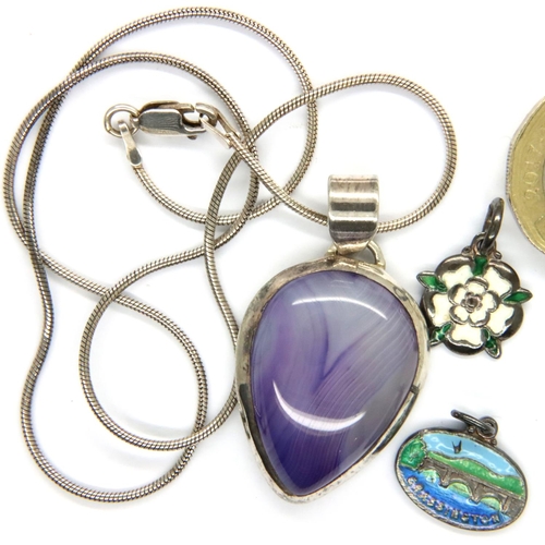 71 - Silver pendant and chain set with a purple stone and two small silver pendants. P&P Group 1 (£14+VAT... 