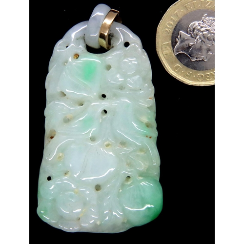 74 - Hand carved jade pendant, H: 55 mm. Some dust gathered in the holes and some surface scratches/marki... 