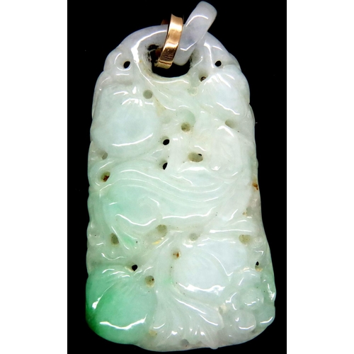 74 - Hand carved jade pendant, H: 55 mm. Some dust gathered in the holes and some surface scratches/marki... 