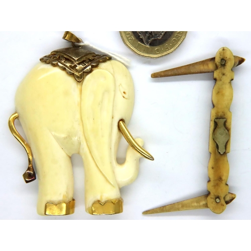 76 - Antique bone elephant pendant and a bone or ivory pen knife style toothpick. P&P Group 1 (£14+VAT fo... 