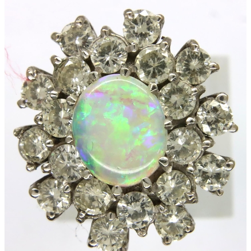78 - Good platinum opal and diamond ring, size N, 8.3g. P&P Group 1 (£14+VAT for the first lot and £1+VAT... 