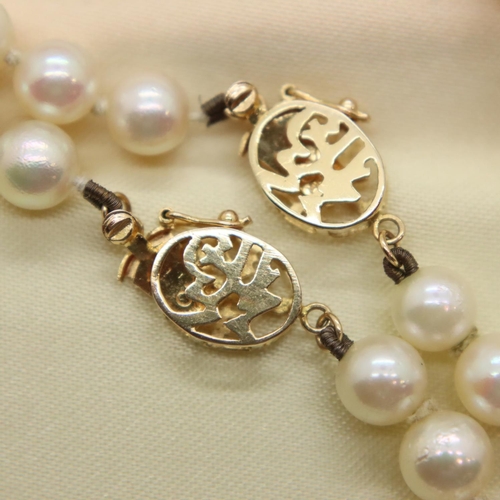 81 - Two strings of pearls with 14ct gold clasps and gold spacers. P&P Group 1 (£14+VAT for the first lot... 