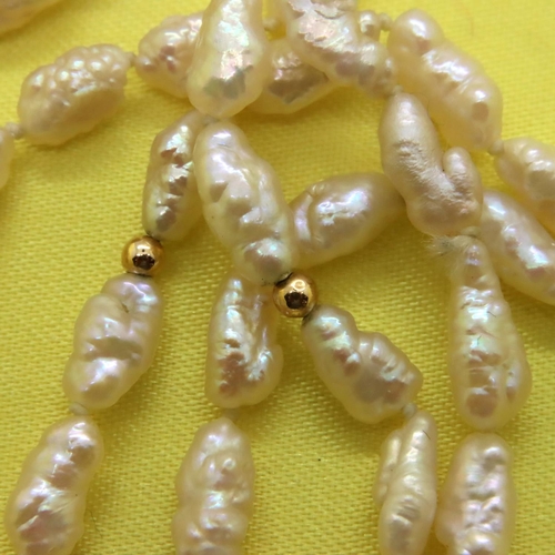 85 - Set of freshwater pearls set with yellow metal ball spacers. P&P Group 1 (£14+VAT for the first lot ... 