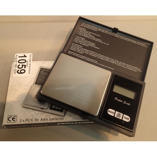 1059 - Boxed digital professional mini jewellery scales. P&P Group 1 (£14+VAT for the first lot and £1+VAT ... 