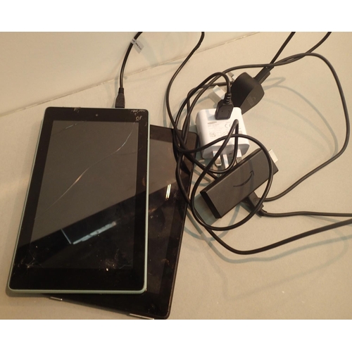 1061 - Two Amazon tablets, one with cracked screen (one charger) and an Amazon Firestick. P&P Group 1 (£14+... 