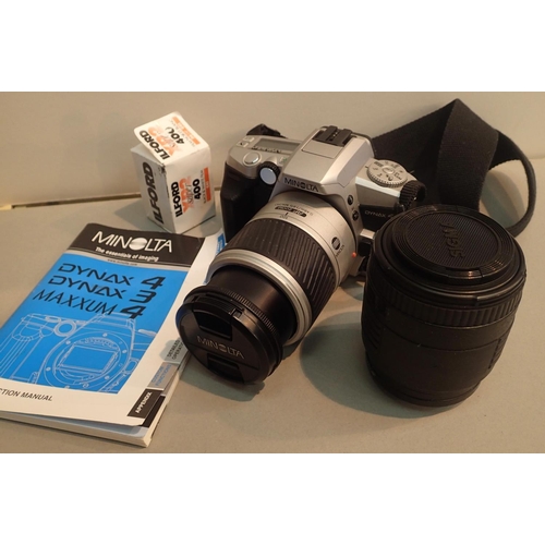 1072 - Minolta Dynax 4 film camera with 28-100 lens and Sigma 70-210 lens. P&P Group 1 (£14+VAT for the fir... 