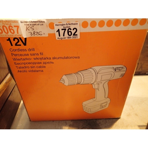 1762 - A boxed cordless 12v drill. Not available for in-house P&P, contact Paul O'Hea at Mailboxes on 01925... 