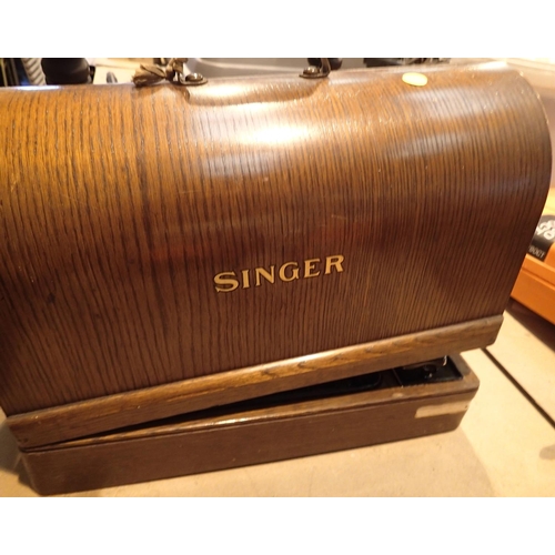 1763 - Cased Singer sewing machine, model: EL883308. Not available for in-house P&P, contact Paul O'Hea at ... 