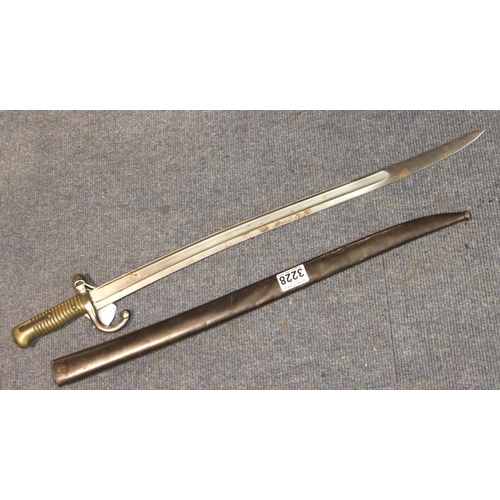 3228 - A French Sabre Bayonet model 1859 with curved blade,  brass hilt and metal scabbard, both numbered 1... 