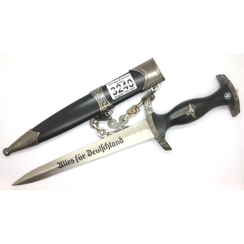 3240 - Reproduction German WWII dagger with chain. P&P Group 2 (£18+VAT for the first lot and £3+VAT for su... 