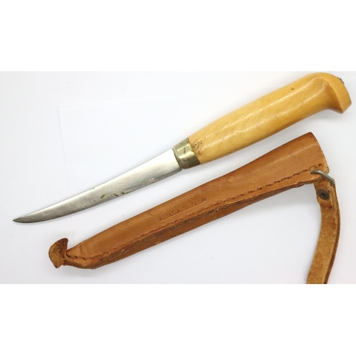 3241 - Normark leather sheathed filleting knife. P&P Group 1 (£14+VAT for the first lot and £1+VAT for subs... 