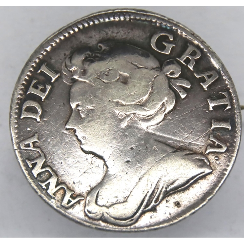 3044 - 1708 silver Shilling of Queen Anne, brooch mounted. P&P Group 1 (£14+VAT for the first lot and £1+VA... 