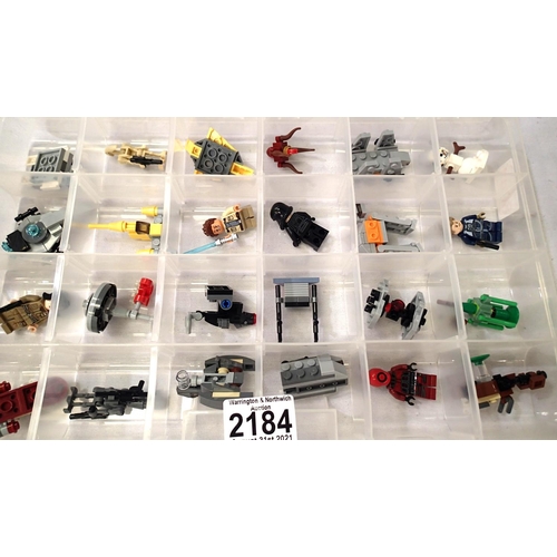 2184 - Box of twenty four assorted Lego advent calendar models and figures. P&P Group 2 (£18+VAT for the fi... 