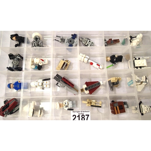 2187 - Box of twenty four assorted Lego advent calendar models and figures. P&P Group 2 (£18+VAT for the fi... 