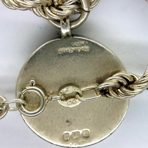 114 - Silver rope necklace and fob. P&P Group 1 (£14+VAT for the first lot and £1+VAT for subsequent lots)