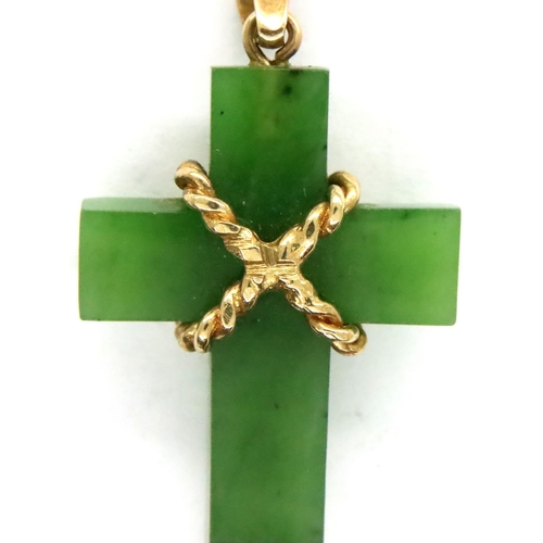 21 - 9ct gold mounted jadeite cross pendant, H: 35 mm. P&P Group 1 (£14+VAT for the first lot and £1+VAT ... 