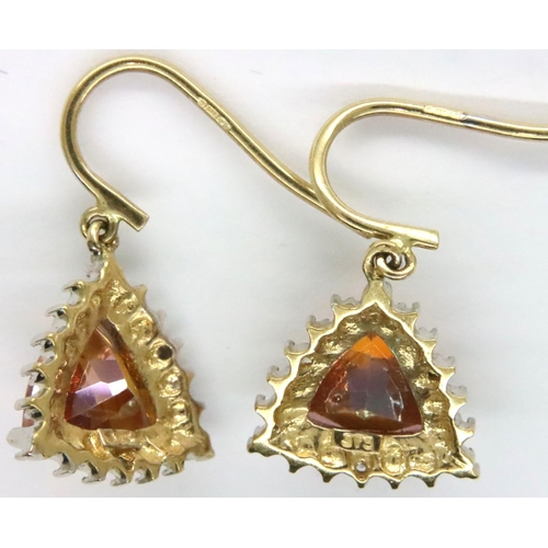 25 - 9ct gold topaz and diamond set earrings, combined 3.0g. P&P Group 1 (£14+VAT for the first lot and £... 