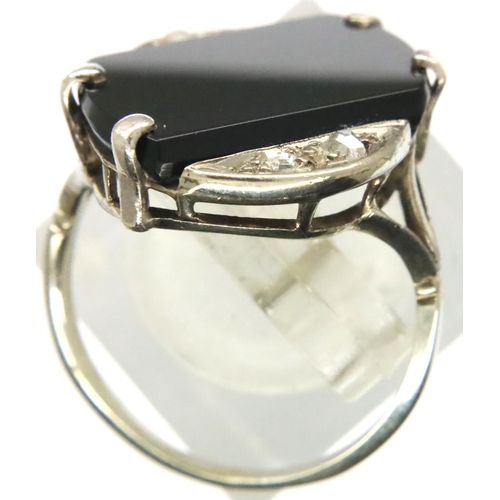 64 - Art Deco period 18ct white gold onyx and diamond set cocktail ring, size Q, 4.9g. P&P Group 1 (£14+V... 