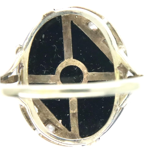 64 - Art Deco period 18ct white gold onyx and diamond set cocktail ring, size Q, 4.9g. P&P Group 1 (£14+V... 