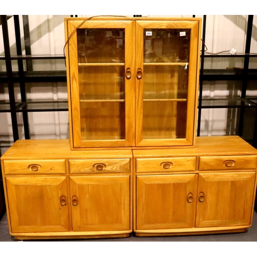 482 - Ercol Windsor light elm amalgamated wall unit of two small sideboards and a glazed two door display ... 