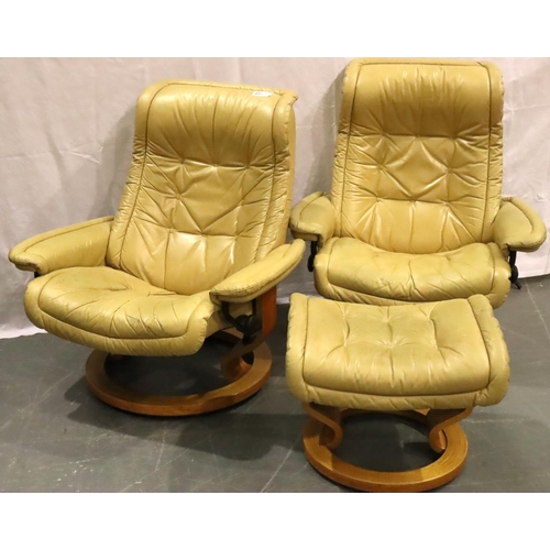 491 - Two Ekornes Stressless biscotti leather reclining chairs and a matching footstool. Some wear to leat... 