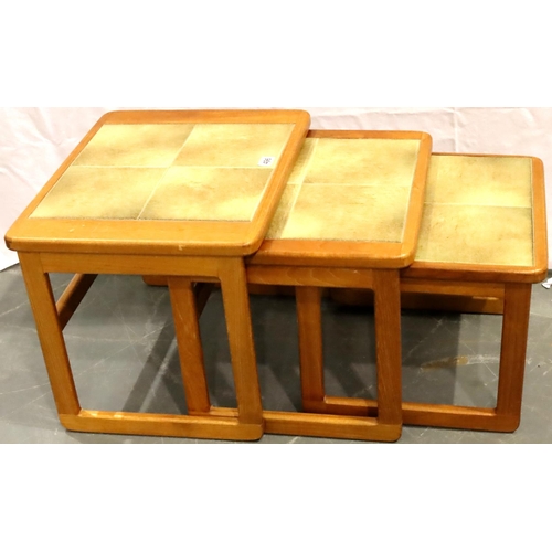 496 - Teak tile topped nest of three tables. Not available for in-house P&P, contact Paul O'Hea at Mailbox... 