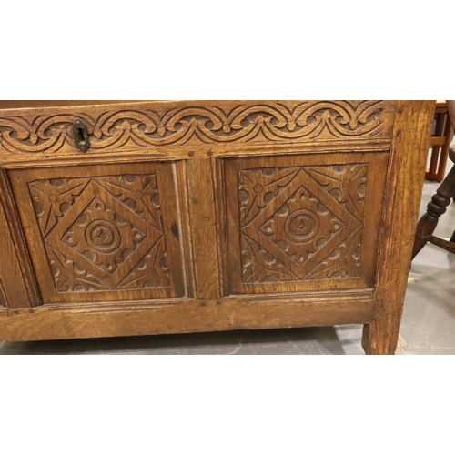 461 - An 18th century oak coffer with internal box, later carving and panelled sides, 114 x 43 x 58 cm H. ... 