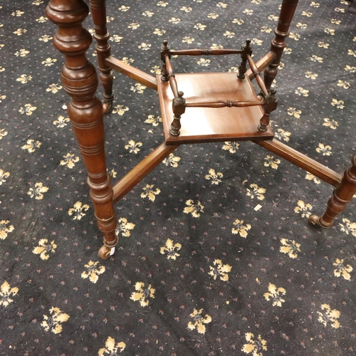 469 - Edwardian walnut games table, the top with swivel and envelope-fold action, green baize and single d... 