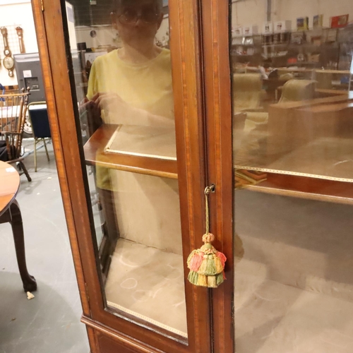 478 - An Edwardian two door display cabinet with two short drawers, under-shelf and velvet lined interior,... 