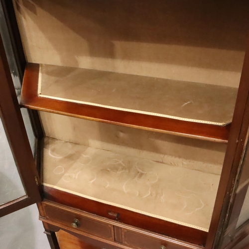 478 - An Edwardian two door display cabinet with two short drawers, under-shelf and velvet lined interior,... 