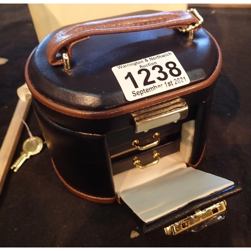 1238 - Small leather jewellery case. Not available for in-house P&P, contact Paul O'Hea at Mailboxes on 019... 