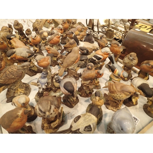 1298 - Quantity of ceramic bird figurines. Not available for in-house P&P, contact Paul O'Hea at Mailboxes ... 