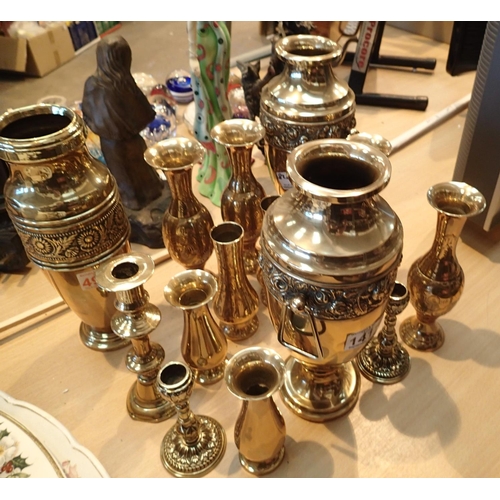 1411 - A selection of brassware to include urns, candlesticks etc. Not available for in-house P&P, contact ... 